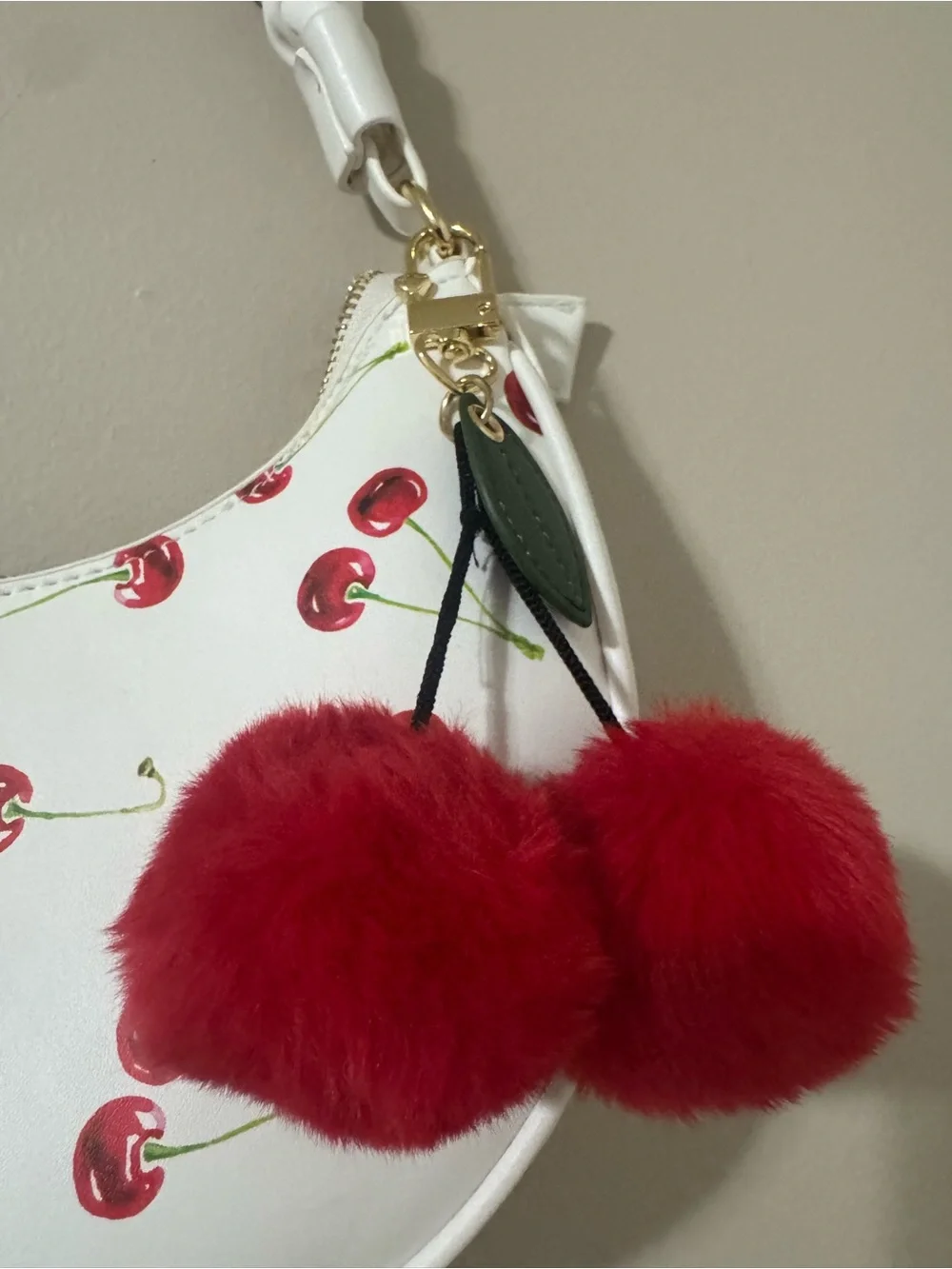 XOXO White Cherry-Print Shoulder Bag with Red Pom Charm